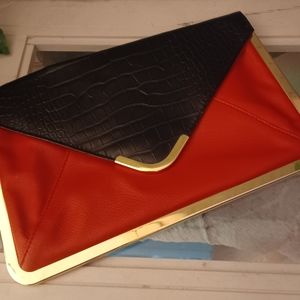 Black and red leather clutch